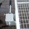Zadný nosič na prepravu zveri s rýchloupínaním, detail na mechanizmus upevnenia.